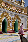 Myanmar - Sagaing, Umin Thounzeh (the 30 Caves), a colourful crescent-shaped colonnade within which there are 45 Buddha images. 